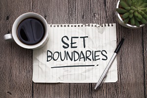 Set boundaries, text words typography written on paper against wooden background, life and business motivational inspirational concept