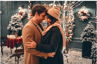 A woman and man are embracing one another during the holidays. Their arms are around one another and their heads are touching. Learning your partners triggers can help you understand each other better and help strengthen your bond together. Couples therapy is offered at our therapy practice in Woodland Hills, CA.