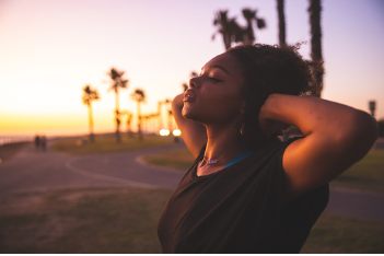 A woman is standing outdoors with her arms up to the sides of her head, enjoying the view. In order to be truly happy, you must do what you need to do for yourself, unapologetically. Individual therapy is offered at our Woodland Hills, CA therapy practice. 91364 | 91307 | 91356 