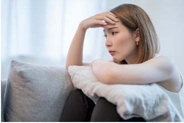 In this image we see a woman looking sad, with her hand on her forehead. It can be difficult to validate your own struggles but therapy can help you in your journey. Virtual and in person therapy is available at our Los Angeles, CA therapy office. 91356 | 91301 | 91302 