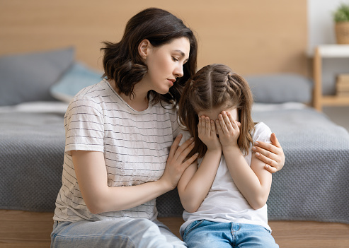 Mother is feeling sorry for a crying child. Mum is hugging her daughter. You can get help and anxiety treatment in Los Angeles, CA with a skilled Anxiety therapist via online therapy in California here. OCD, or obsessive compulsive disorder, can also be helped here as well. 
91361 | 90265 | 90290 | 91367 | 91364 | 91335 
