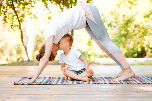 Mom and son do yoga in the summer park. Healthy lifestyle. Family sport. Therapy for mood disorders in Woodland Hills CA can help with coping with depression using cognitive behavioral therapy. 
    91406 | 91405 | 91343 | 91324 | 91304