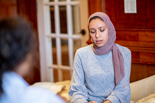 Young Muslim woman at a counseling session to address red flags in relationships, codependency, and poor boundaries. Adolescents can get help from an anxiety therapist for anxiety treatment in Los Angeles, CA here and with online therapy in California. You can also get help for obsessive compulsive disorder in Los Angeles, CA here too. 91326 | 91303 | 91307 | 91377 | 91320 