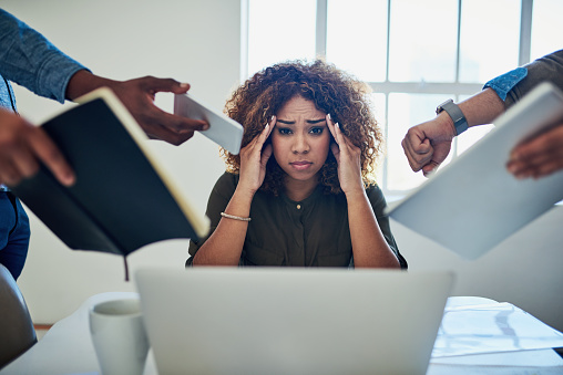 Shot of a stressed out young woman working in a demanding career. You are dealing with anxiety and stress and find it hard to cope with it, our CBT therapists can share coping skills in Woodland Hills, CA 91364. 