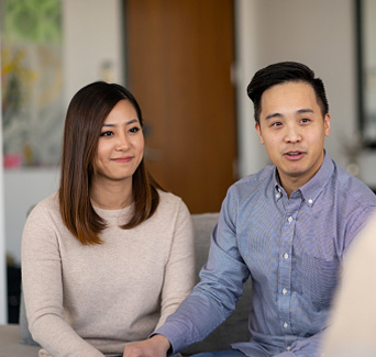 This image may depict A couple is sitting in front of a therapist. The couple may be attending in person couples therapy to help with their relationship problems. Embracing You Therapy offers in person couples and marriage counseling to help with your relationship needs.