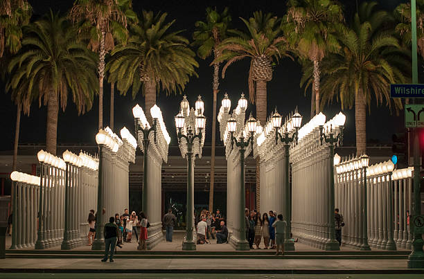 In this image we see the LACMA lights in Los Angeles at nighttime.