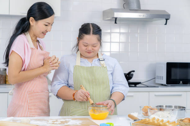 Mother and daughter enjoy baking together in the kitchen to Connect with your teen